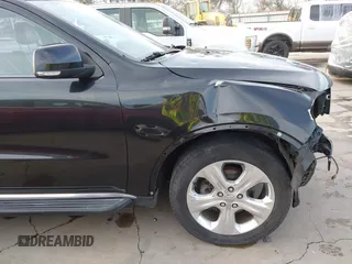 2014 Dodge Durango Limited z VIN 1C4RDJDG5EC593711, wystawiony jako IAAI lot #41717501 z przebiegiem 151 107 mil mil oraz . Historia ofert i sprzedaży dostępna na DreamBid. Obrazek 18.