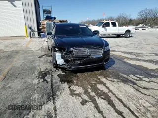 2017 Lincoln Continental Livery z VIN 1LN6L9UK8H5621014, wystawiony jako Copart lot #52145875 z przebiegiem 50 842 mil mil oraz Szkoda całkowita • Salvage title. Historia ofert i sprzedaży dostępna na DreamBid. Obrazek 14.