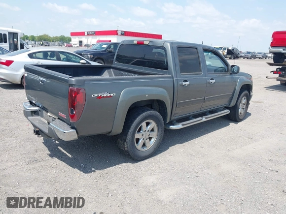 2010 GMC Canyon SLE1 with VIN 1GTJTCDE5A8135402, listed as a IAAI auction lot 42016563 with 281,039 mi miles. Bid and sale history available at carsss.com. Image 4.