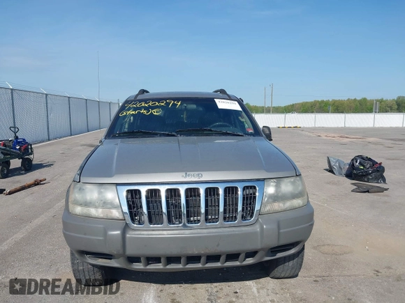 2002 Jeep Grand Cherokee with VIN 1J8GW48N72C207838, listed as a IAAI auction lot 42020294 with 181,283 mi miles and . Bid and sale history available at DreamBid. Image 13.