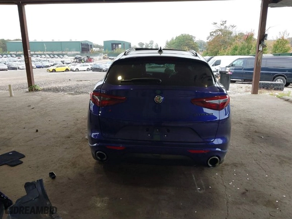 2021 Alfa Romeo Stelvio Ti with VIN ZASPAKBN4M7D21284, listed as a IAAI auction lot 40573443 with 26,230 mi miles. Bid and sale history available at carsss.com. Image 16.