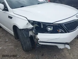 2015 Kia Optima LX with VIN KNAGM4A75F5632779, listed as a IAAI auction lot 41701231 with 174,458 mi miles. Bid and sale history available at carsss.com. Image 6.