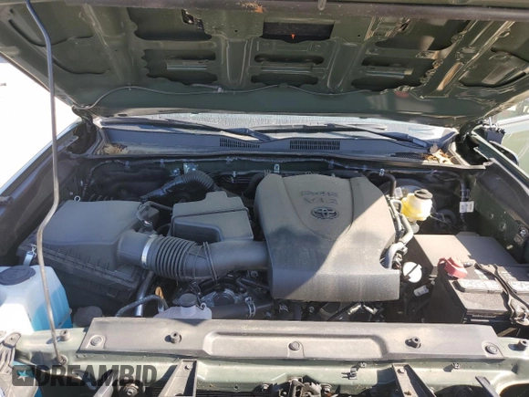 2022 Toyota Tacoma SR с VIN 3TMCZ5AN8NM519084, выставлен на аукционе Copart как лот 57512005 с пробегом 23 692 миль миль и Списание • Salvage title. История ставок и продаж доступна на DreamBid. Изображение 11.
