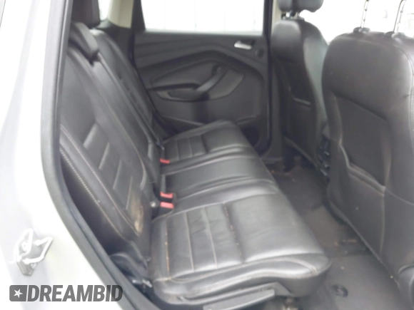 2014 Ford Escape Titanium с VIN 1FMCU0J98EUC28001, выставлен на аукционе IAAI как лот 42442784 с пробегом 163 159 миль миль и . История ставок и продаж доступна на DreamBid. Изображение 8.