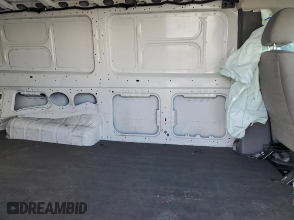 2019 Nissan NV Cargo S z VIN 1N6BF0KM7KN809036, wystawiony jako Copart lot #55559605 z przebiegiem 84 451 mil mil oraz Szkody całkowita. Historia ofert i sprzedaży dostępna na DreamBid. Obrazek 11.