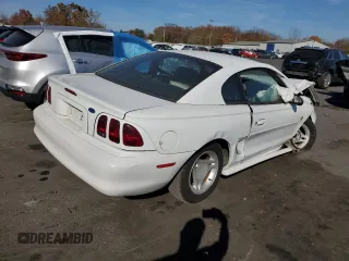 1997 Ford Mustang with VIN 1FALP4041VF194986, listed as a Copart auction lot 78841404 with 118,936 mi miles and Salvage Title. Bid and sale history available at carsss.com. Image 3.