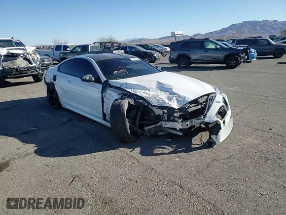 2015 BMW M6 z VIN WBSLX9C54FD160753, wystawiony jako Copart lot #83486484 z przebiegiem 80 275 mil mil oraz Szkody całkowita. Historia ofert i sprzedaży dostępna na DreamBid. Obrazek 11.