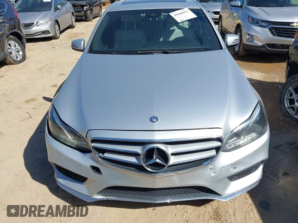 2014 Mercedes-Benz E-Class E 250 BlueTEC Luxury with VIN WDDHF0EB6EA967831, listed as a IAAI auction lot 41660612 with 187,041 mi miles. Bid and sale history available at carsss.com. Image 12.