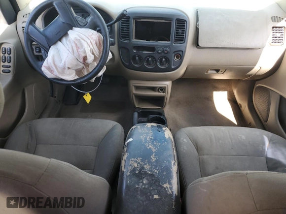 2004 Ford Escape with VIN 1FMCU02194DA23228, listed as a Copart auction lot 72161464 with 167,233 mi miles and Salvage title. Bid and sale history available at DreamBid. Image 8.