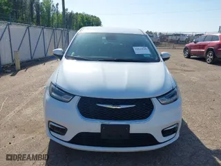 2023 Chrysler Pacifica Touring L with VIN 2C4RC1BG8PR625017, listed as a IAAI auction lot 42029628 with 62,221 mi miles. Bid and sale history available at carsss.com. Image 12.