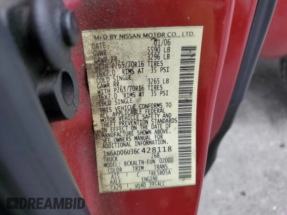 2006 Nissan Frontier SE z VIN 1N6AD06U36C428118, wystawiony jako Copart lot #53117415 z przebiegiem 164 046 mil mil oraz Szkoda całkowita • Salvage title. Historia ofert i sprzedaży dostępna na DreamBid. Obrazek 14.