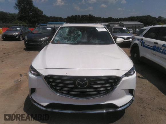 2017 Mazda CX-9 Signature with VIN JM3TCBEY2H0140598, listed as a IAAI auction lot 42561999 with 61,574 mi miles and . Bid and sale history available at DreamBid. Image 12.