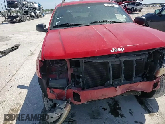 1999 Jeep Grand Cherokee Laredo z VIN 1J4G258SXXC518308, wystawiony jako Copart lot #56636235 z przebiegiem 233 649 mil mil oraz Szkoda całkowita • Salvage title. Historia ofert i sprzedaży dostępna na DreamBid. Obrazek 14.