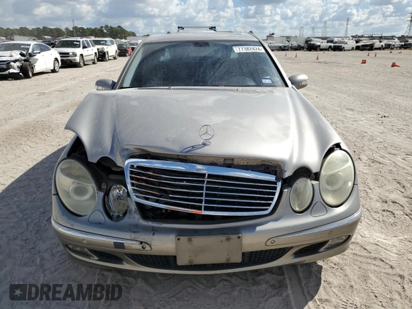 2003 Mercedes-Benz E-Class 5.0L with VIN WDBUF70J73A119596, listed as a Copart auction lot 77382424 with 237,620 mi miles and Salvage Title. Bid and sale history available at carsss.com. Image 5.