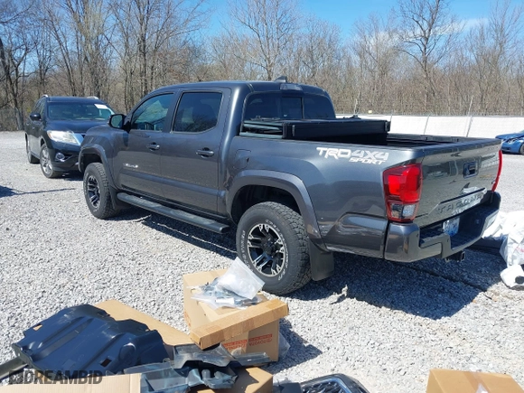 2019 Toyota Tacoma 4WD SR with VIN 3TMCZ5AN2KM268915, listed as a IAAI auction lot 41696555 with 33,573 mi miles. Bid and sale history available at carsss.com. Image 3.