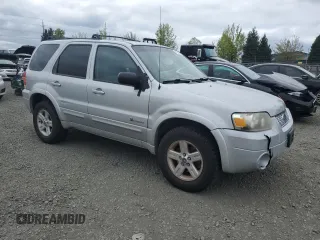 2005 Ford Escape Hybrid with VIN 1FMCU96H75KC95236, listed as a Copart auction lot 54528685 with 186,511 mi miles and Clean title. Bid and sale history available at DreamBid. Image 4.