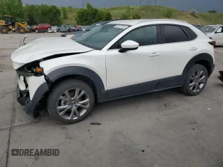 2022 Mazda CX-30 S Select with VIN 3MVDMBBL9NM411859, listed as a Copart auction lot 59875745 with 52,878 mi miles and Salvage title. Bid and sale history available at DreamBid. Image 1.