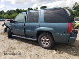 1999 GMC Denali z VIN 1GKEK13R5XR906686, wystawiony jako Copart lot #64451994 z przebiegiem 273 180 mil mil oraz Szkody całkowita. Historia ofert i sprzedaży dostępna na DreamBid. Obrazek 2.