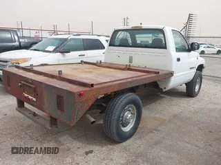1999 Dodge Ram 2500 with VIN 3B7KF26Z6XM582878, listed as a IAAI auction lot 41891791 with 28,990 mi miles. Bid and sale history available at carsss.com. Image 4.