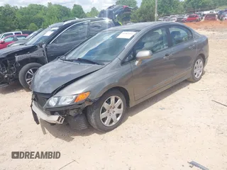 2007 Honda Civic LX z VIN 1HGFA16507L002857, wystawiony jako IAAI lot #42187455 z przebiegiem 111 591 mil mil oraz . Historia ofert i sprzedaży dostępna na DreamBid. Obrazek 2.