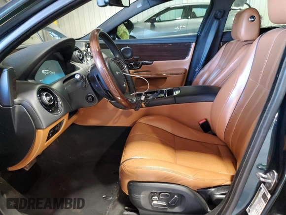 2014 Jaguar XJ with VIN SAJWA2GTXEMV72147, listed as a Copart auction lot 44854485 with 103,814 mi miles and Salvage Title. Bid and sale history available at DreamBid. Image 7.