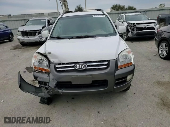 2005 Kia Sportage LX with VIN KNDJF723057125954, listed as a Copart auction lot 79454554 with 179,811 mi miles and Salvage Title. Bid and sale history available at carsss.com. Image 12.