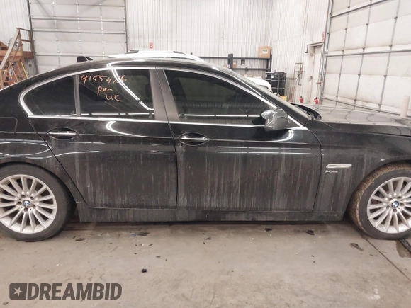 2011 BMW 5 Series 535i xDrive with VIN WBAFU7C58BC778429, listed as a IAAI auction lot 41554736 with 129,163 mi miles. Bid and sale history available at carsss.com. Image 14.