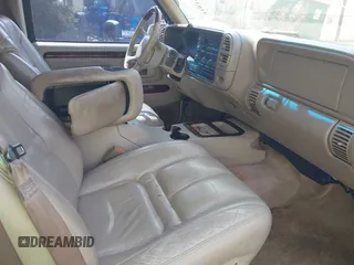 1999 Cadillac Escalade z VIN 1GYEK13R9XR400123, wystawiony jako IAAI lot #41837946 z przebiegiem 207 213 mil mil oraz . Historia ofert i sprzedaży dostępna na DreamBid. Obrazek 5.