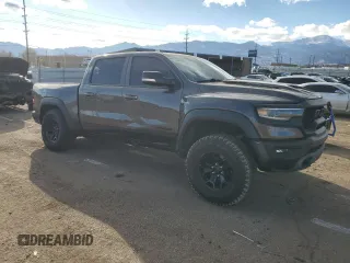 2021 Ram 1500 TRX with VIN 1C6SRFU98MN741605, listed as a Copart auction lot 84763114 with 40,065 mi miles and Salvage Title. Bid and sale history available at carsss.com. Image 4.