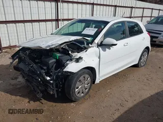 2018 Kia Rio LX with VIN 3KPA25AB0JE086253, listed as a IAAI auction lot 41387302 with 40,553 mi miles and . Bid and sale history available at DreamBid. Image 2.