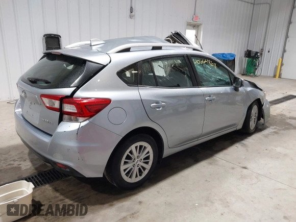 2018 Subaru Impreza Premium with VIN 4S3GTAD67J3724617, listed as a IAAI auction lot 40664868 with 1 mi miles. Bid and sale history available at carsss.com. Image 4.
