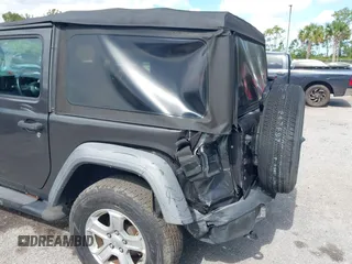 2018 Jeep Wrangler Sport with VIN 1C4GJXAG5JW138437, listed as a IAAI auction lot 42694278 with 58,258 mi miles and . Bid and sale history available at DreamBid. Image 6.