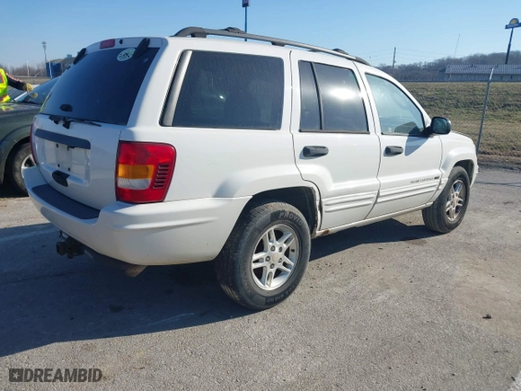 2004 Jeep Grand Cherokee Laredo with VIN 1J4GX48S84C206933, listed as a IAAI auction lot 41739364 with 257,893 mi miles. Bid and sale history available at carsss.com. Image 4.