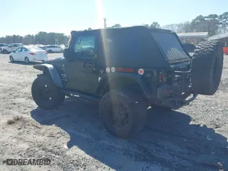 2010 Jeep Wrangler Mountain with VIN 1J4AA2D10AL120620, listed as a IAAI auction lot 41785857 with 173,040 mi miles. Bid and sale history available at carsss.com. Image 3.