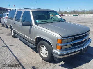 1999 Chevrolet Suburban with VIN 3GNEC16R9XG253081, listed as a IAAI auction lot 41719007 with 196,884 mi miles. Bid and sale history available at carsss.com. Image 1.