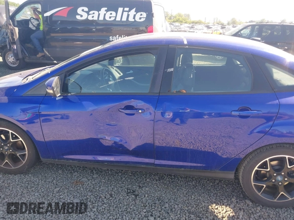2013 Ford Focus SE z VIN 1FADP3F28DL178210, wystawiony jako IAAI lot #42199073 z przebiegiem 110 542 mil mil oraz . Historia ofert i sprzedaży dostępna na DreamBid. Obrazek 6.