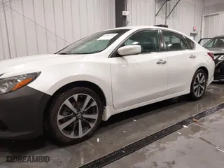 2017 Nissan Altima 2.5 SR with VIN 1N4AL3AP5HC265540, listed as a IAAI auction lot 41284731 with 125,504 mi miles. Bid and sale history available at carsss.com. Image 14.