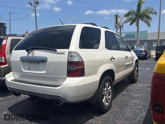 2004 Acura MDX Touring with VIN 2HNYD18954H530413, listed as a Copart auction lot 57705325 with 207,938 mi miles and Clean title. Bid and sale history available at DreamBid. Image 4.