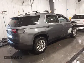2020 Chevrolet Traverse LT with VIN 1GNEVHKW9LJ176834, listed as a IAAI auction lot 42211350 with 100,188 mi miles and . Bid and sale history available at DreamBid. Image 4.
