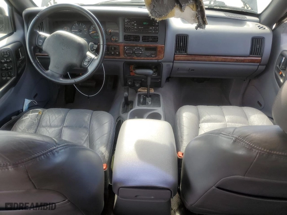 1998 Jeep Grand Cherokee Limited with VIN 1J4GZ78Y0WC140588, listed as a Copart auction lot 49522445 with 62,195 mi miles and Salvage Title. Bid and sale history available at carsss.com. Image 8.