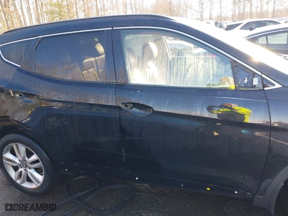 2014 Hyundai Santa Fe Sport with VIN 5XYZWDLA4EG141110, listed as a IAAI auction lot 41265982 with 121,909 mi miles. Bid and sale history available at carsss.com. Image 14.