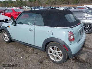 2013 MINI Cooper Convertible with VIN WMWZN3C53DT135427, listed as a IAAI auction lot 41954817 with 57,029 mi miles. Bid and sale history available at carsss.com. Image 3.