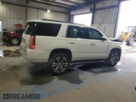 2016 GMC Yukon SLT with VIN 1GKS1BKC5GR450147, listed as a Copart auction lot 51058805 with 163,944 mi miles and Salvage Title. Bid and sale history available at carsss.com. Image 3.