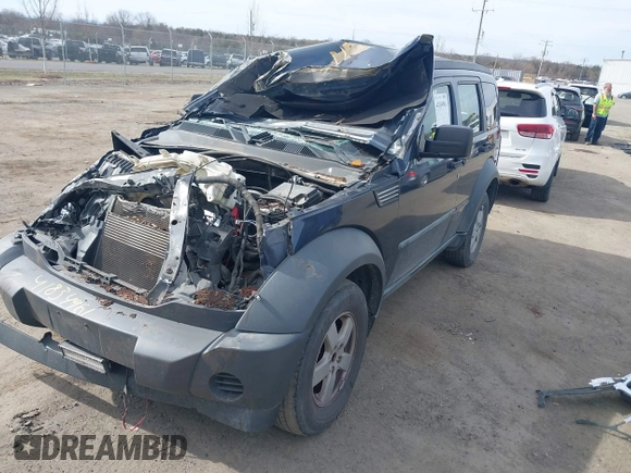 2008 Dodge Nitro SXT with VIN 1D8GU28K28W189765, listed as a IAAI auction lot 41834961 with 214,837 mi miles. Bid and sale history available at carsss.com. Image 2.