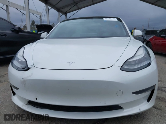 2020 Tesla Model 3 Performance z VIN 5YJ3E1EC4LF625109, wystawiony jako IAAI lot #41735149 z przebiegiem 95 010 mil mil oraz . Historia ofert i sprzedaży dostępna na DreamBid. Obrazek 13.