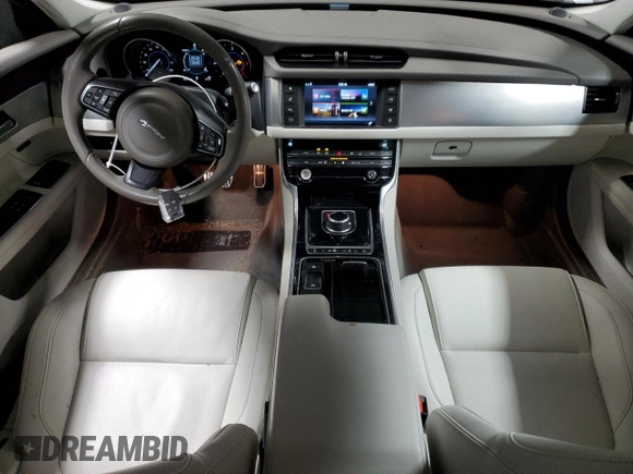 2017 Jaguar XF with VIN SAJBJ4BN3HCY42655, listed as a Copart auction lot 87798165 with 80,700 mi miles and Salvage Title. Bid and sale history available at DreamBid. Image 8.