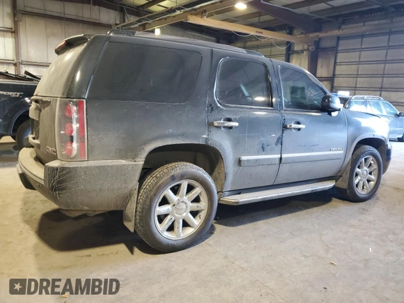 2011 GMC Yukon Denali with VIN 1GKS2EEF6BR321895, listed as a Copart auction lot 88364515 with 99,115 mi miles and Salvage Title. Bid and sale history available at DreamBid. Image 3.