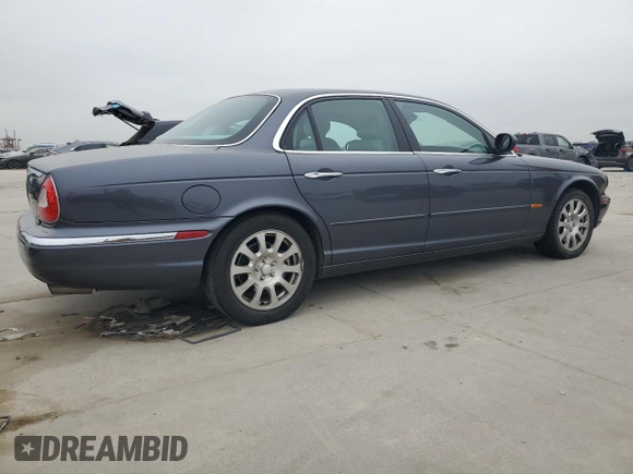 2004 Jaguar XJ with VIN SAJWA71C04SG22878, listed as a Copart auction lot 44383205 with 127,515 mi miles and Clean Title. Bid and sale history available at carsss.com. Image 3.