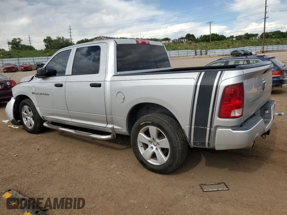 2012 Ram 1500 Express with VIN 1C6RD7KT1CS142370, listed as a Copart auction lot 60756925 with 106,627 mi miles and Salvage title. Bid and sale history available at DreamBid. Image 2.