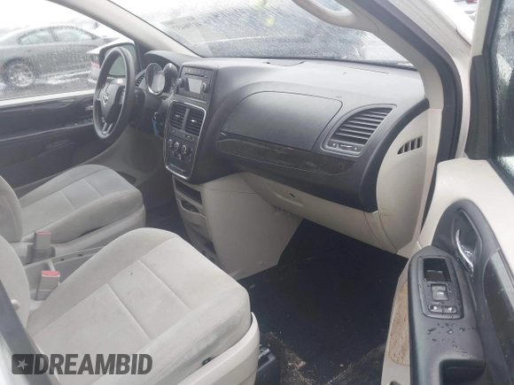 2012 Dodge Grand Caravan SXT with VIN 2C4RDGCG4CR304472, listed as a IAAI auction lot 41396437 with 180,309 mi miles and . Bid and sale history available at DreamBid. Image 5.